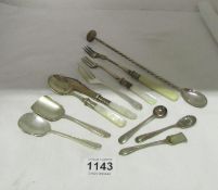 A mixed lot of flatware including caddy and salt spoons