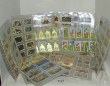 A mixed lot of loose sheet tea cards