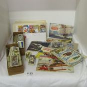 A large mixed lot of cigarette cards, tea cards and first day covers