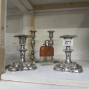 2 pairs of candlesticks and a hip flask