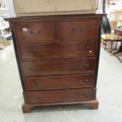 A 2 over 4 mahogany chest of drawers