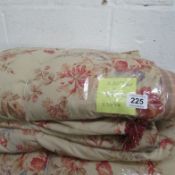 A pair of fully lined curtains 230cm deep x 124cm wide with pelmet