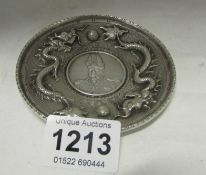 An Oriental silver coin tray