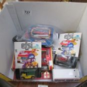 A box of toys, model cars etc