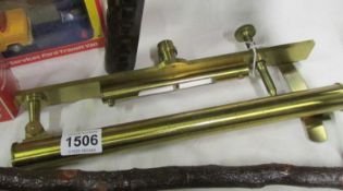 A brass nautical level