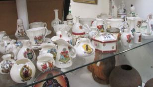 A large collection of crested china including Goss