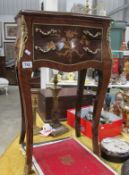 An inlaid 2 drawer cabinet