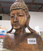 A carved wood Buddha