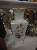 A large hand painted 2 handled Oriental vase with gilded dragon handles, 45cm tall