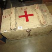 A wooden first aid box