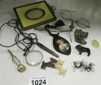 A mixed lot including photo frame, monacle etc