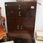 A rosewood music cabinet