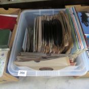 A box of 45rpm, 78rpm and LP records