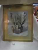 A watercolour of crocus's in bowl signed G M Brough