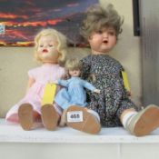 A German Koppelson A12M doll, A Roddy walkie-talkie doll and an antique doll with head markings