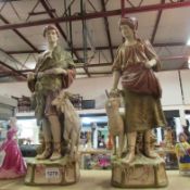 A pair of Royal Dux figurines being shepherdess and goat herder