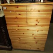 A 2 over 2 modern pine chest of drawers