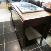 A period oak drop leaf table