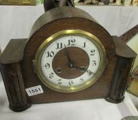 An oak mantel clock