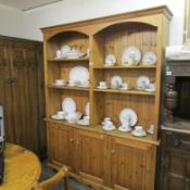 A pine triple door bookcase