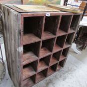 A pine 16 section storage unit