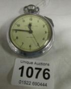 An Ingersol Triumph pocket watch