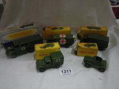 A boxed Dinky 689 Medium artillery tractor, and 4 other military vehicles (626, 623, 641 & 673)