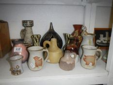 A mixed lot of studio pots and jugs