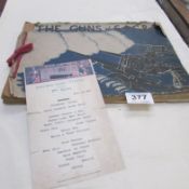 A copy of 'The Guns of 6.A.G.R.A.' and a copy of Titanic menu