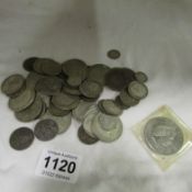 Approximately 390g of pre 1947 silver coins and a Â£5 coin