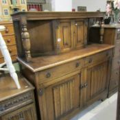 An oak court cupboard