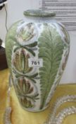 A pottery leaf decorated vase