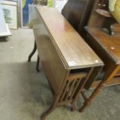 A Victorian drop leaf table