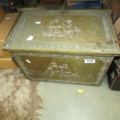 A brass coal box