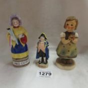 A Goebel figurine, Mrs Camp figurine and Mr Bumble figurine