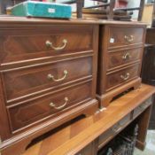 A pair of 3 drawer bedroom chests