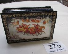 A lacquered box with sleigh scene