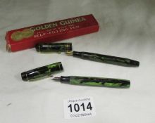 2 'Golden Guinea' self filling fountain pens