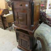 A pair of mahogany bedside cabinets