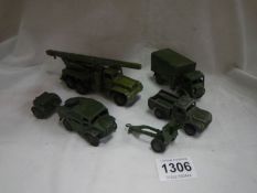 A quantity of unboxed Dinky military vehicles including 607 field gun