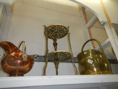 A brass coal scuttle, copper scuttle and brass plant stand