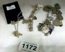 A silver charm bracelet, silver bird pendant and silver bracelet