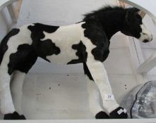 A toy Palamino pony