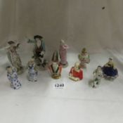 A mixed lot of small figurines and busts