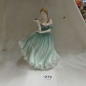 A Royal Doulton figurine, Pretty Ladies 'in my heart'.