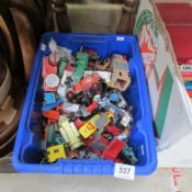 A box of playworn die cast cars