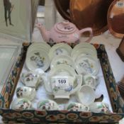 A boxed Japanese toy tea set and a Snow White teapot