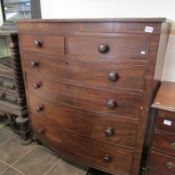 A Victorian 2 over 4 mahogany bow front chest of drawers