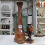 An African wood lamp base and a treen vase
