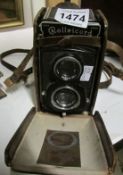 A leather cased Rolliecord camera
